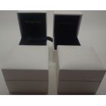 Four Pandora charm boxes