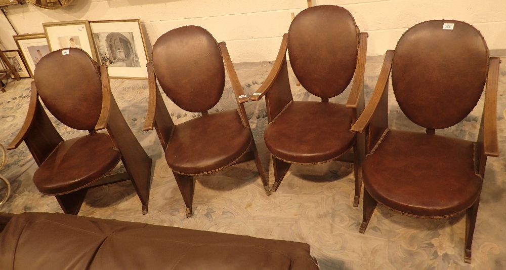 Set of four leather upholstered oak fra