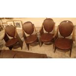 Set of four leather upholstered oak fra