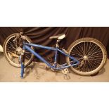 Apollo 7005 blue mountain bike with two detached wheels