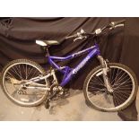 Shockwave XT700 blue mountain bike with front and rear suspension