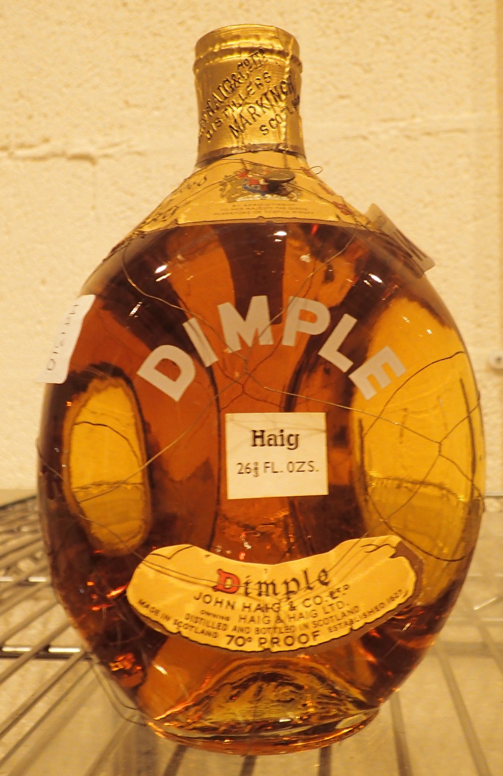 1950s bottle of John Haig and Co Dimple whisky,