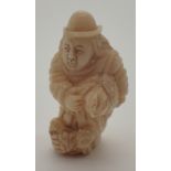 Bone Oriental God figurine,