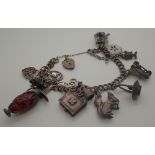 925 silver charm bracelet full of 925 silver and enamel towns and cities souvenir shields