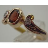 Ladies 14ct gold garnet and diamond fancy ring,