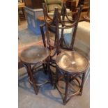Three Bentwood stools and a chair