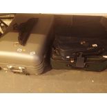 Hard cased Globetrotter suitcase and two soft Globetrotter cases