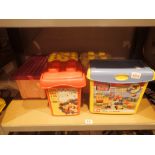 Box of Lego and Duplo bricks in tubs and Mega Blocks and Fisher Price trio