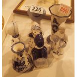 Four Delftware figurines and two small vases