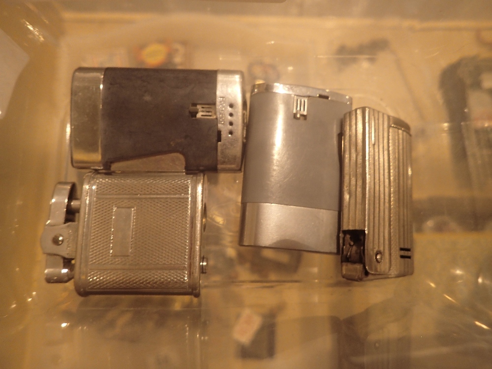 Box of four vintage lighters