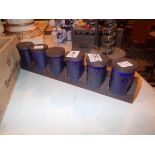 Set of Hornsea blue pattern spice jars on a rack