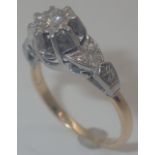 18ct gold and platinum solitaire ring,