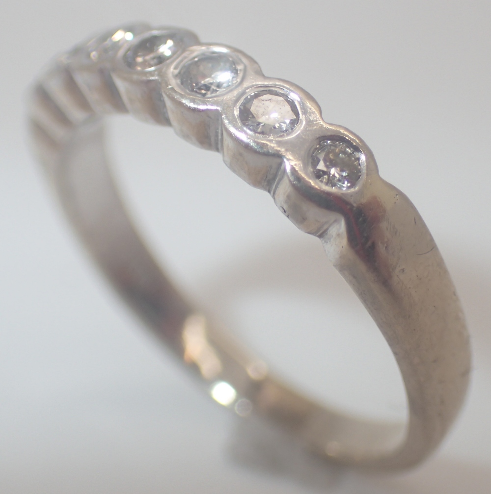 14ct white gold seven stone half eternity ring, approximately 0.