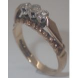 18ct gold three stone illusion set diamond ring,