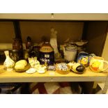 Shelf of mixed items including glass ceramics hip flasks Tetley tea cookie jar etc