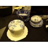 Quantity of blue and white items including Abbey ware and a cheese dome