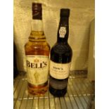 Bottle of Dows Master Blend reserve port and a 1ltr bottle of Bells Whisky