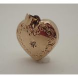 9ct gold heart shaped locket set with diamond and original interior