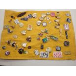 Approximately fifty enamel badges including motorcycles