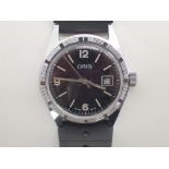 Oris date mid size gents wristwatch on a rubber strap