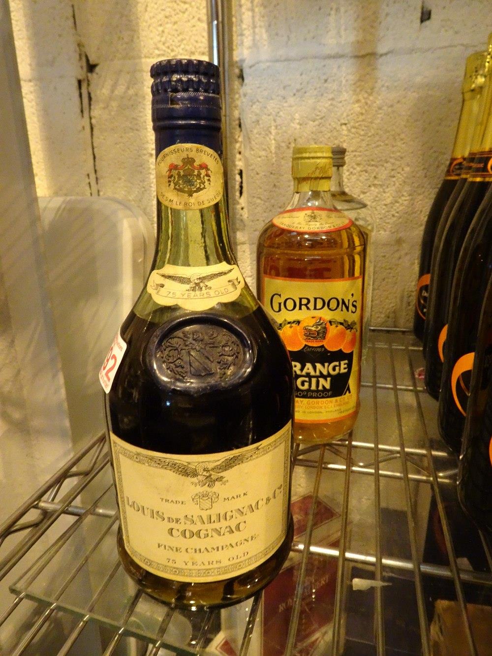 Bottle of Louis De Salignac fine champagne cognac 75 years old level just below seal no volume