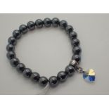 Haematite ball bracelet with sterling silver collar