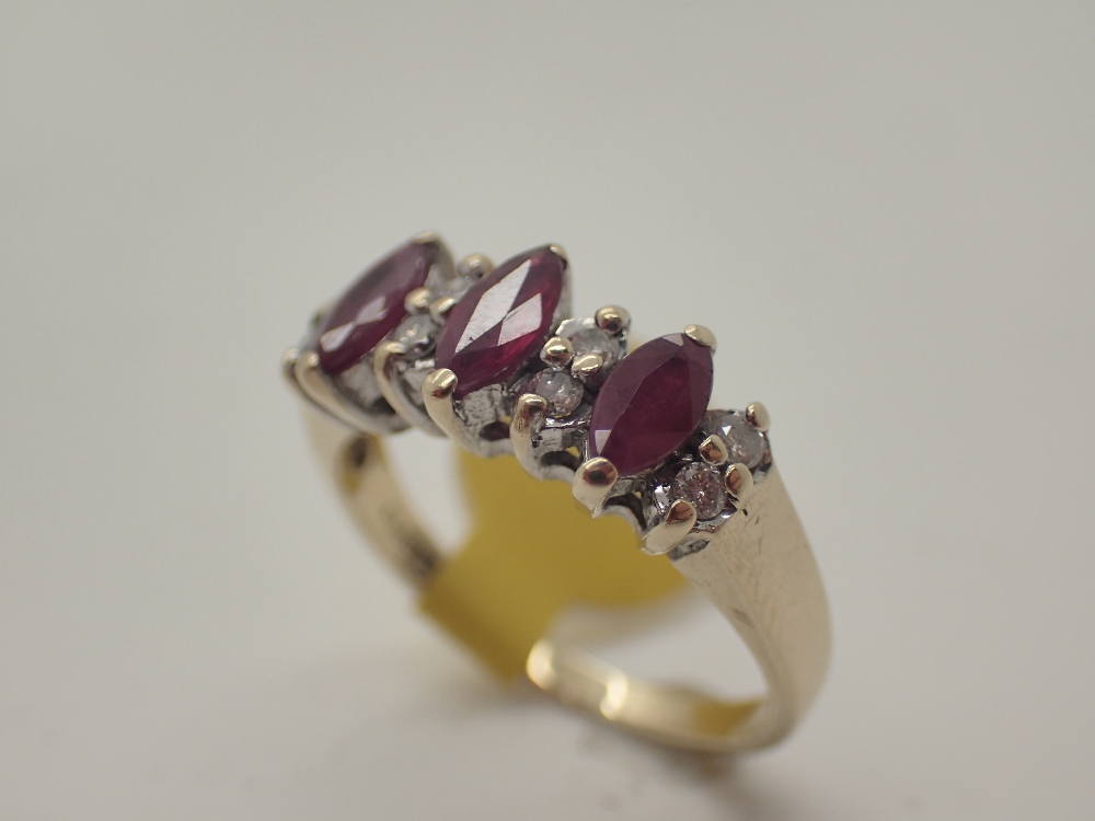 9ct gold marquise cut ruby and diamond ring, size M/N