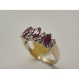 9ct gold marquise cut ruby and diamond ring, size M/N