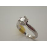 18ct white gold diamond solitaire ring, approximately 0.90ct diamonds, size O