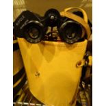 Pair of leather cased binoculars