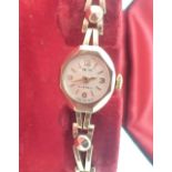 9ct gold Smiths ladies cocktail wristwatch and gold strap 11.