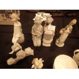 Collection of Lladro and Nao and similar figurines