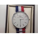 New and boxed white metal Daniel Wellington wristwatch on a fabric strap