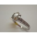 14ct white gold diamond solitaire ring in diamond set mount, approximately 1.