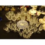 Mahogany tray with decanter and glasses and a large quantity of crystal