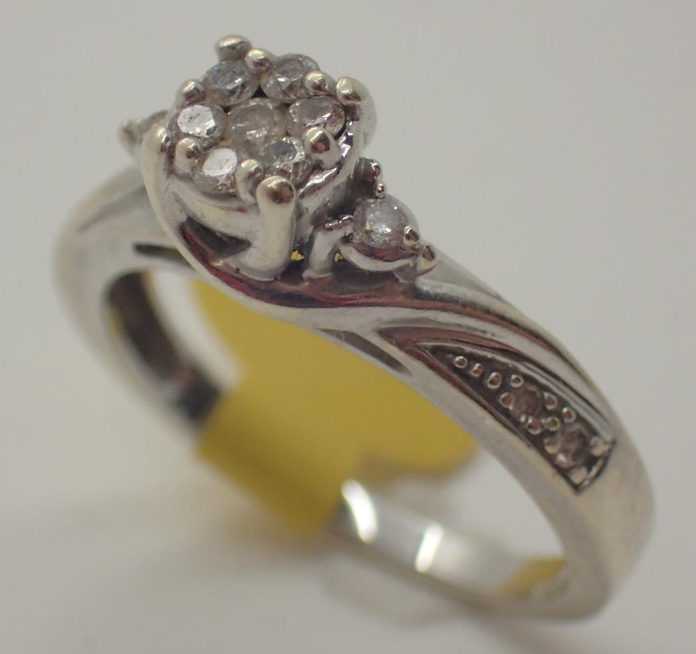 9ct white gold diamond cluster ring,