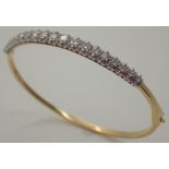 18ct gold and diamond hinged bangle approximately 1ct diamonds D: 6 cm