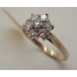 9ct gold seven stone diamond daisy cluster ring, approximately 0.50ct diamonds, size L