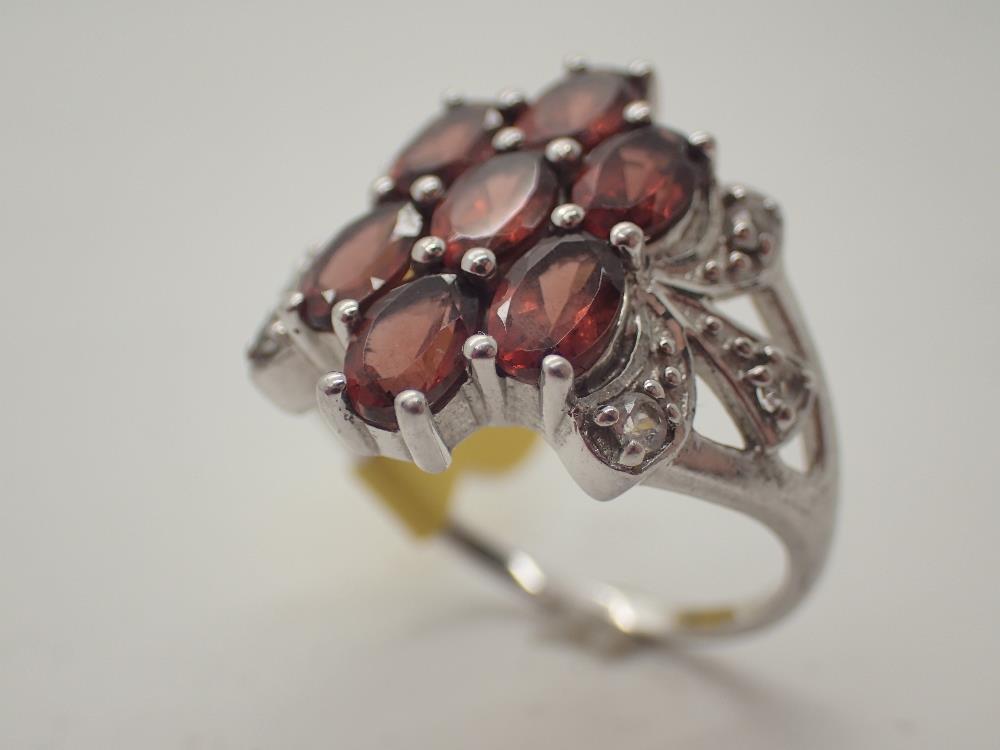 Sterling silver fancy garnet cluster ring,