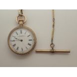 Gold plated Waltham fob watch on a yellow metal chain CONDITION REPORT: This item is