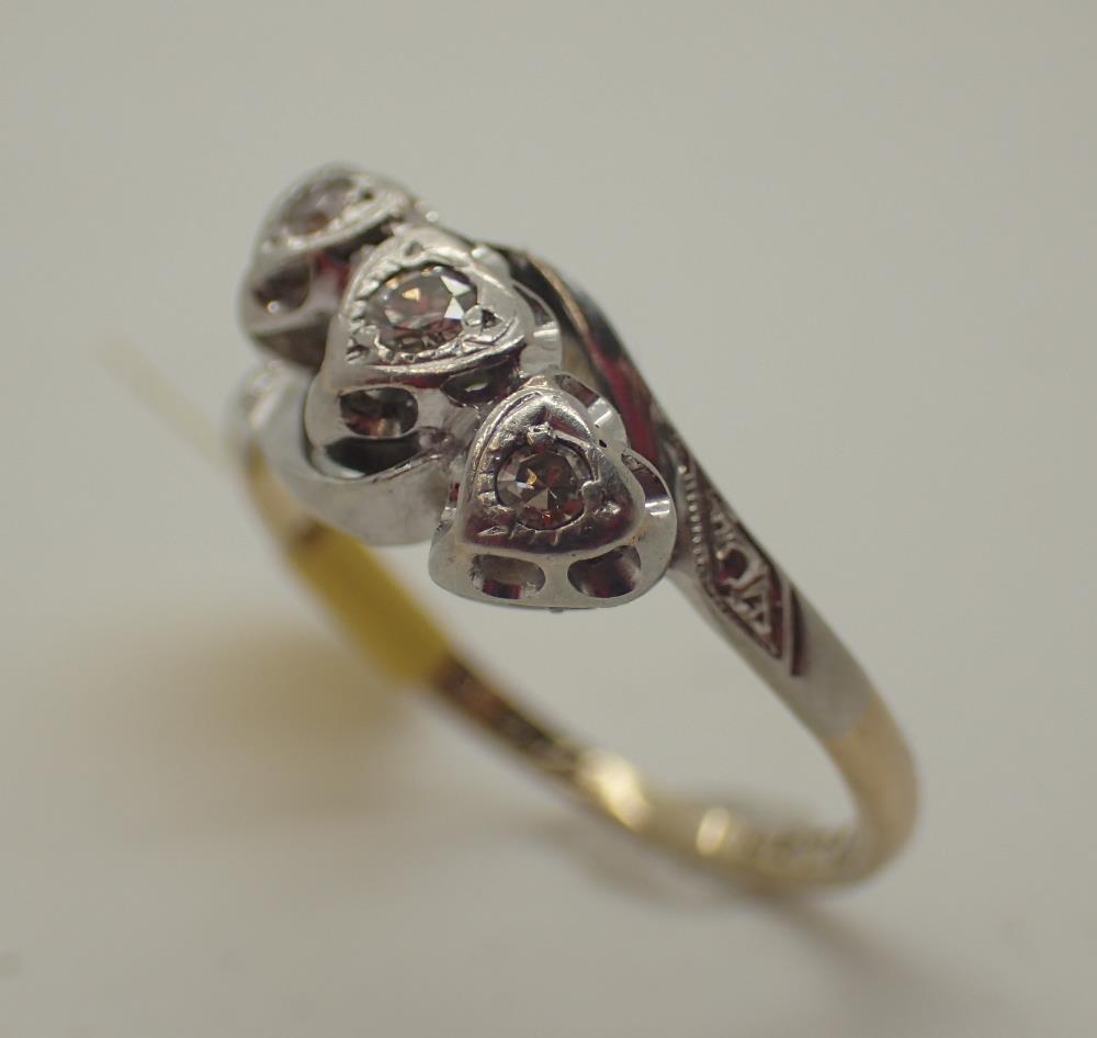 18ct gold and platinum vintage three stone diamond ring with heart shaped setting,