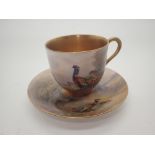 Royal Worcester gilded demi-tasse cup and saucer decorated with pheasants signed Jas Stinton c1922