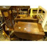 Antique oak dropleaf dining table and two plant stands