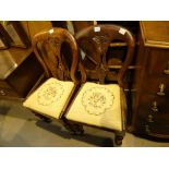 Pair of Victorian spoonback mahogany chairs with embroidered seats