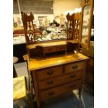 Victorian dressing table with carved mirror supports and two short over two long drawers A/F