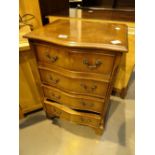 Serpentine fronted mahogany chest of four drawers