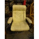 Retro style ivory leather swivel armchair with black piping and tubular stainless steel frame