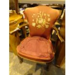 Mahogany framed antique armchair with embroidered back