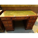 Large green leather topped pine kneehole desk