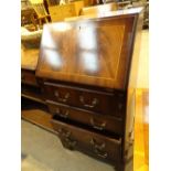 Flame mahogany dropfront bureau with four drawers